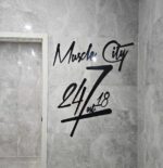 Die-cut metal sign